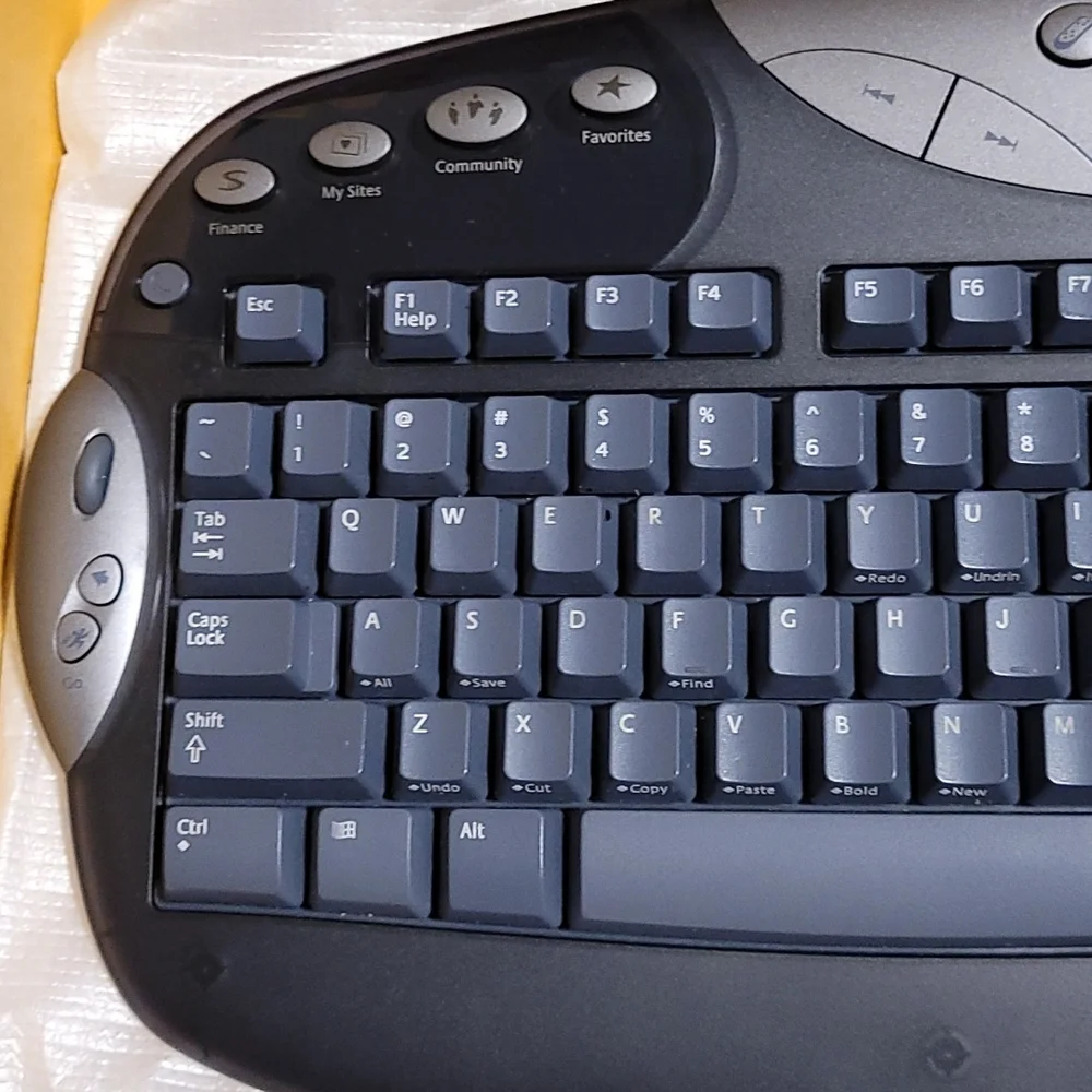 Logitech cordless freedom optical - cordless keyboard and optical mouse